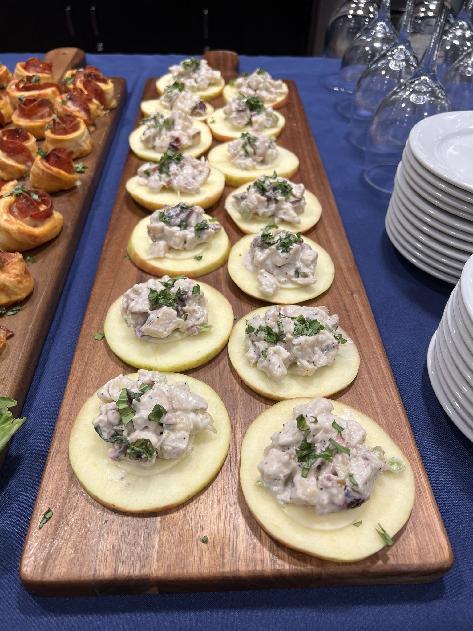 Apple Canapé Appetizers — Chicken salad on apple slices with prosciutto-topped pastries.