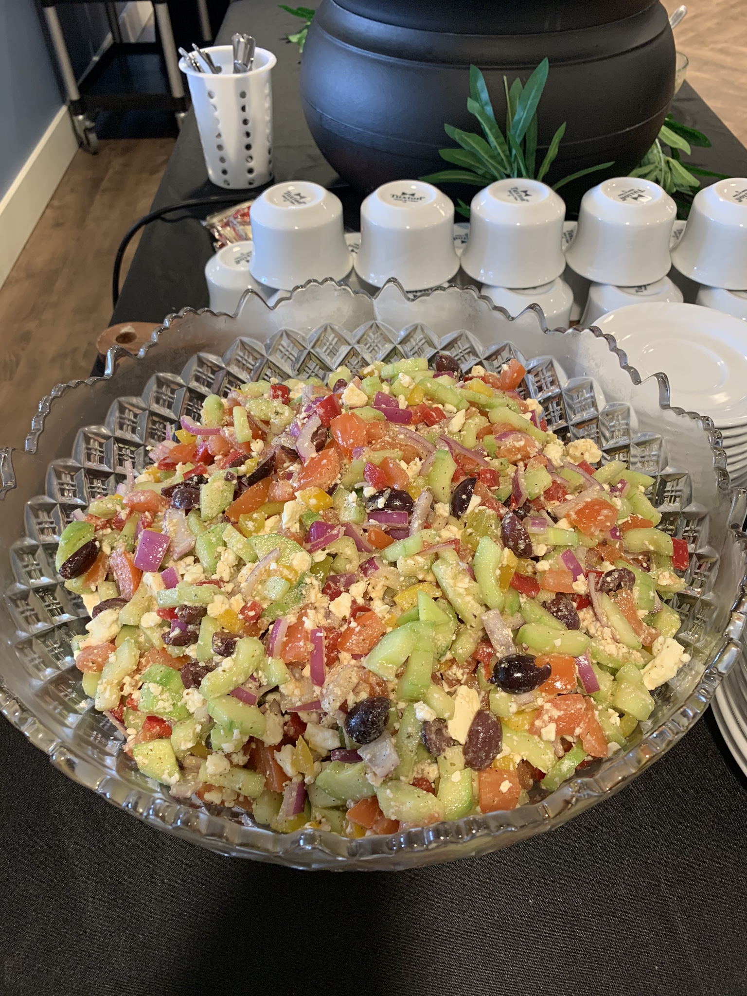 Greek Salad Buffet — Fresh chopped Greek salad with feta, olives, and cucumbers on the buffet line.