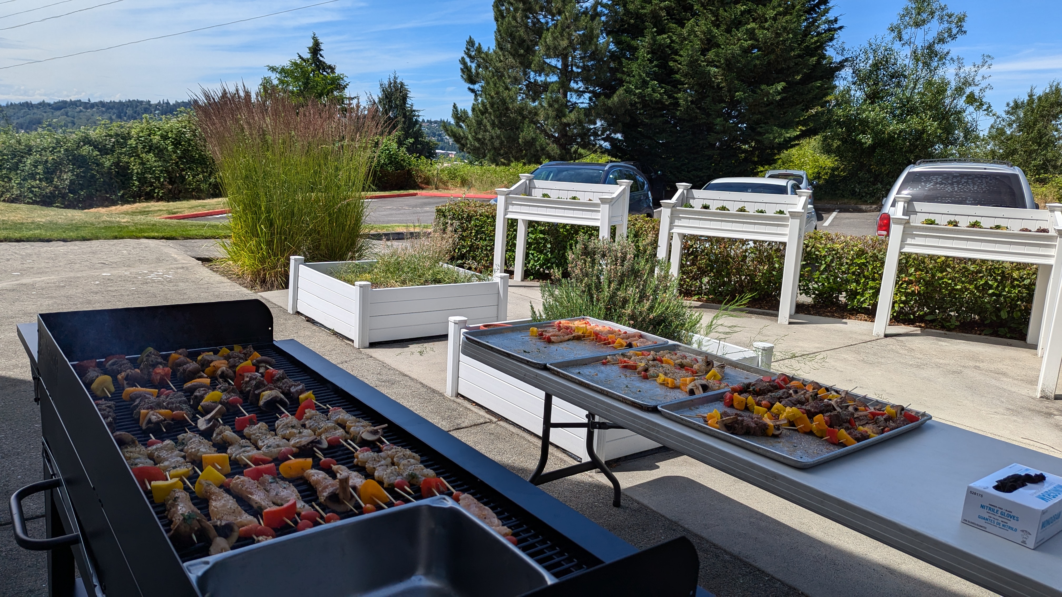 Outdoor Grilling Station — High-volume kabob grilling for an outdoor resident event.